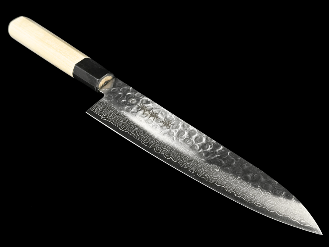 Japanese chef knife illustrating the differences between Japanese and Western knives